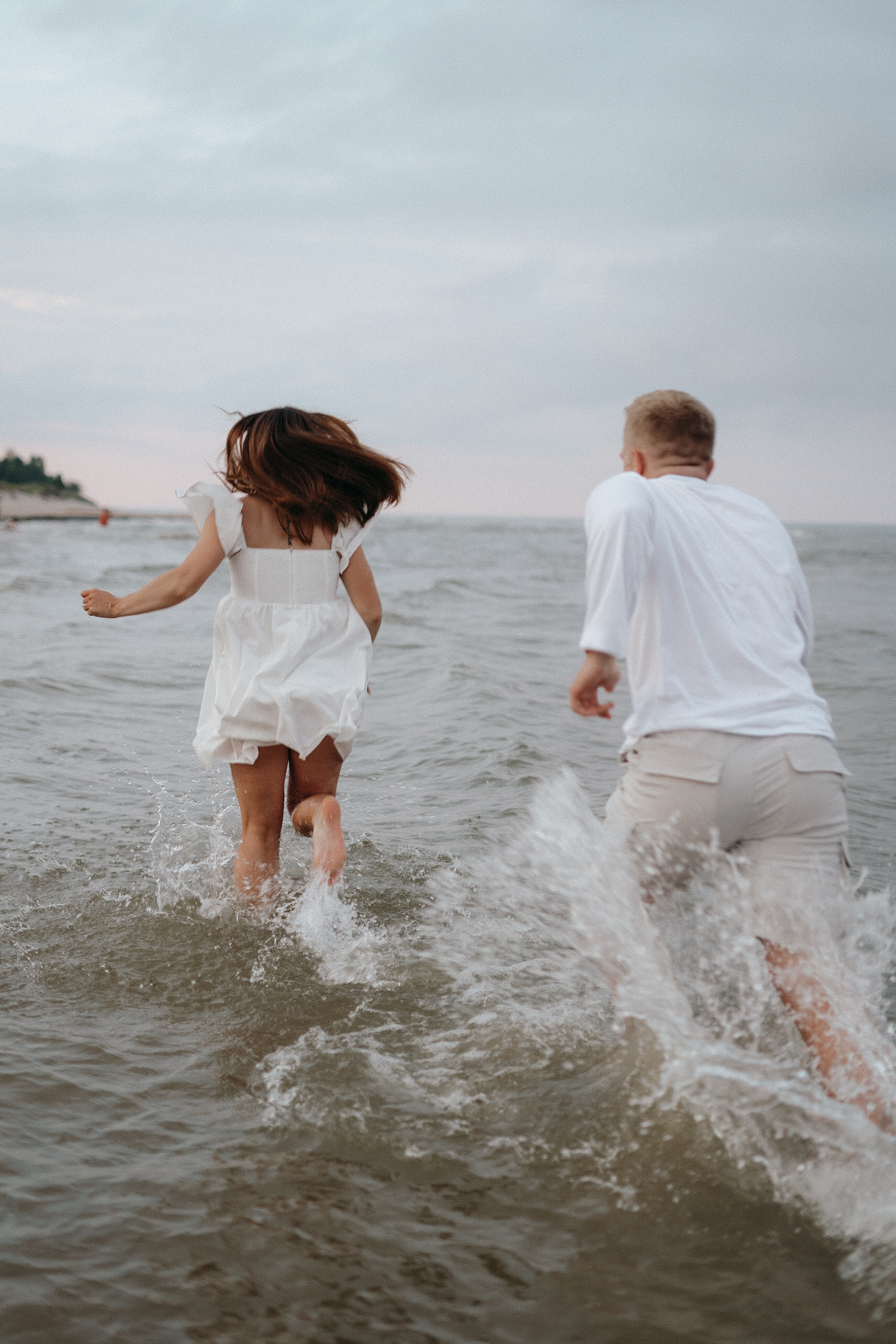 Romantic Couple running through the water