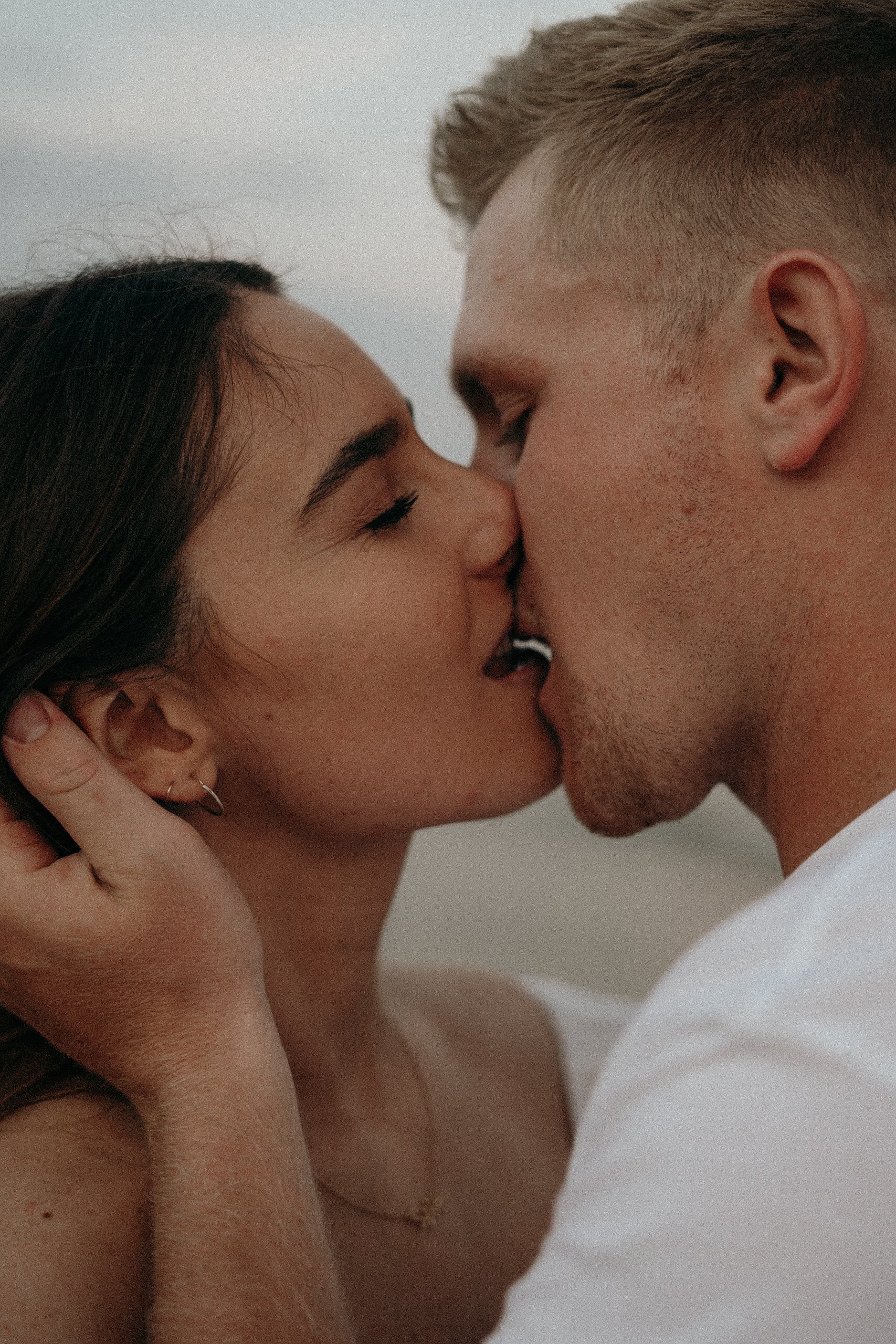 kissing couple on the beach